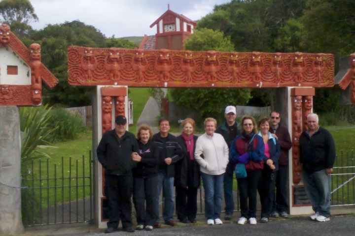 a group of people standing in front of a building