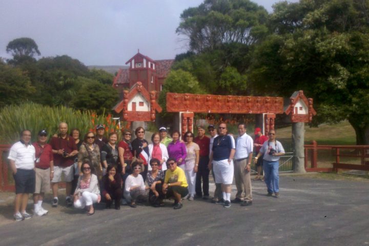 a group of people walking down a street
